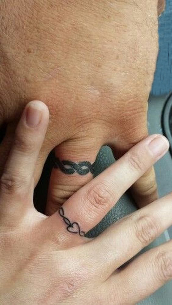 经久不变的黑色简单个性线条情侣戒指纹身图案