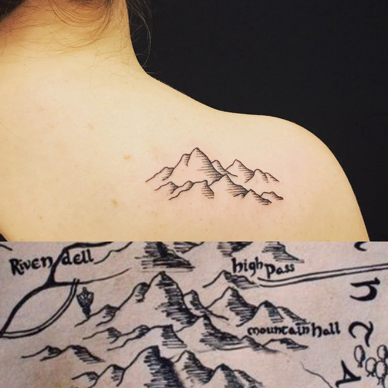 女生背部黑灰线条素描创意文艺山脉风景纹身图片