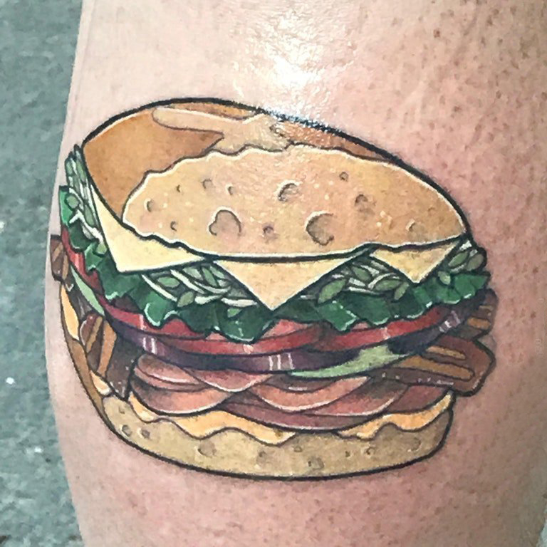 食物纹身 男生小腿上彩色的食物纹身图片