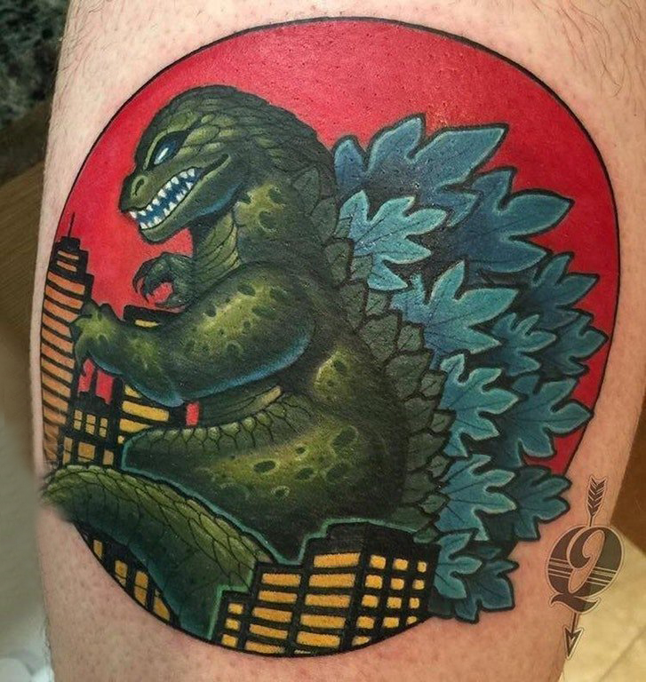 小恐龙纹身 男生大腿上彩色的恐龙纹身图片
