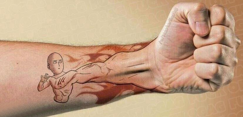 手臂纹身素材 男生手臂上彩色的卡通纹身图片