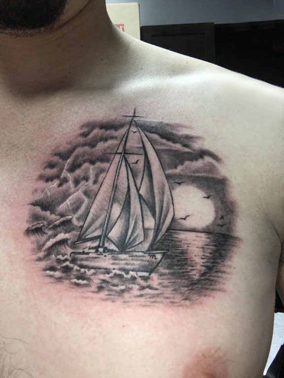 纹身小帆船 男生胸部黑色的帆船纹身图片
