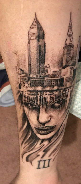 欧美小腿纹身 男生小腿上建筑物和人物肖像纹身图片
