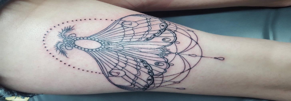 蝴蝶图腾纹身图案 女生手臂上蝴蝶图腾纹身图案