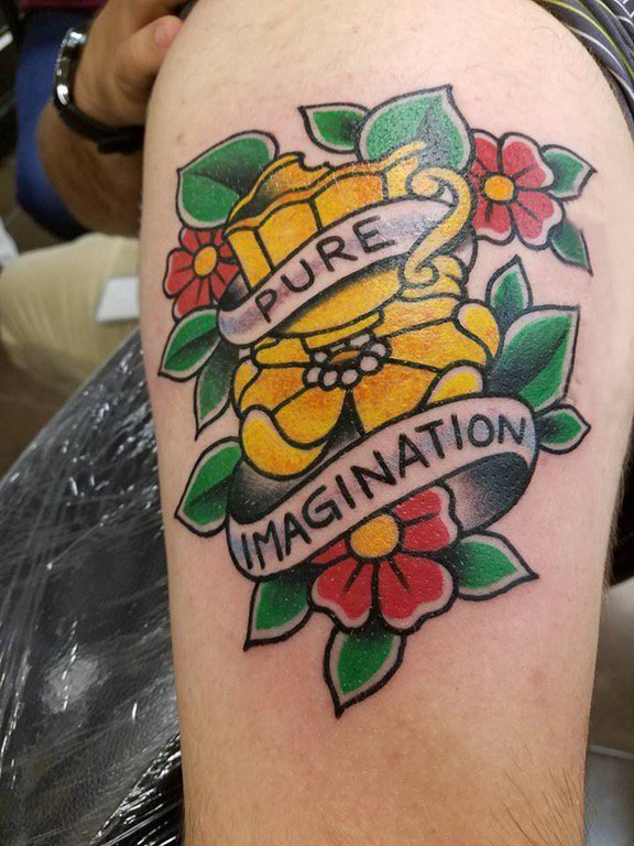 文艺花朵纹身 男生小腿上彩色花朵纹身图案