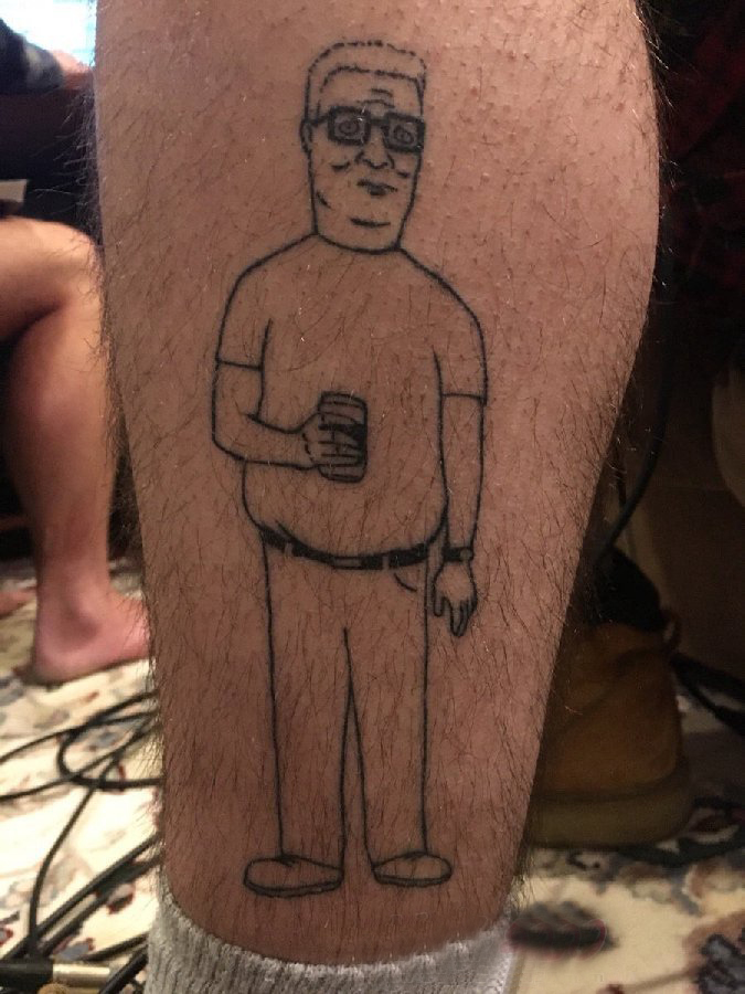 纹身卡通 男生小腿上人物肖像纹身图片