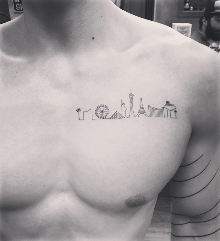 极简线条纹身 男生胸部黑色的建筑物纹身图片