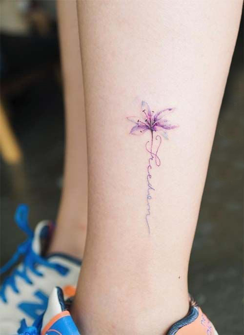 花朵纹身 女生小腿上彩色的花朵纹身图片