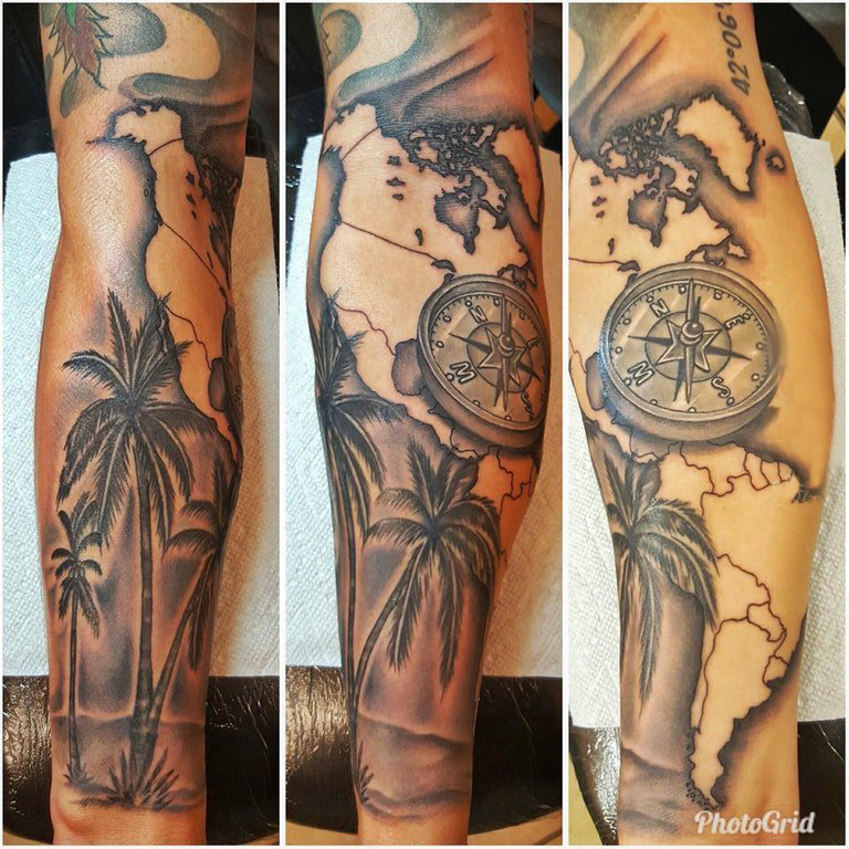 手臂纹身素材 男生手臂上指南针和椰树纹身图片