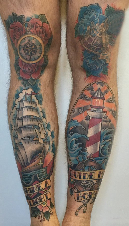 腿部纹身 男生小腿上帆船和灯塔纹身图片