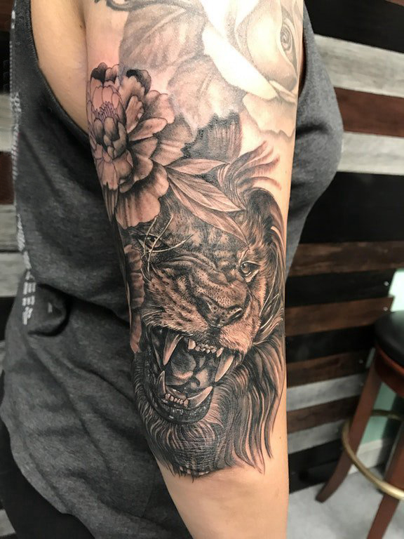 唐狮子纹身 男生手臂上唐狮子纹身图案