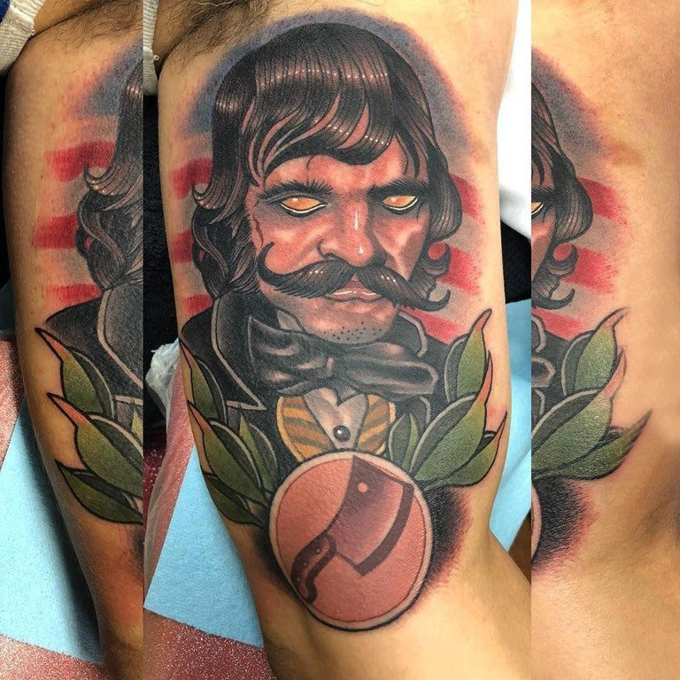 外国人纹身  男生手臂上彩色的外国人纹身图片