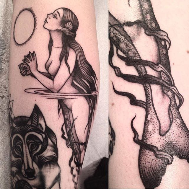 纹身美人鱼  女生手臂上黑灰的美人鱼纹身图片