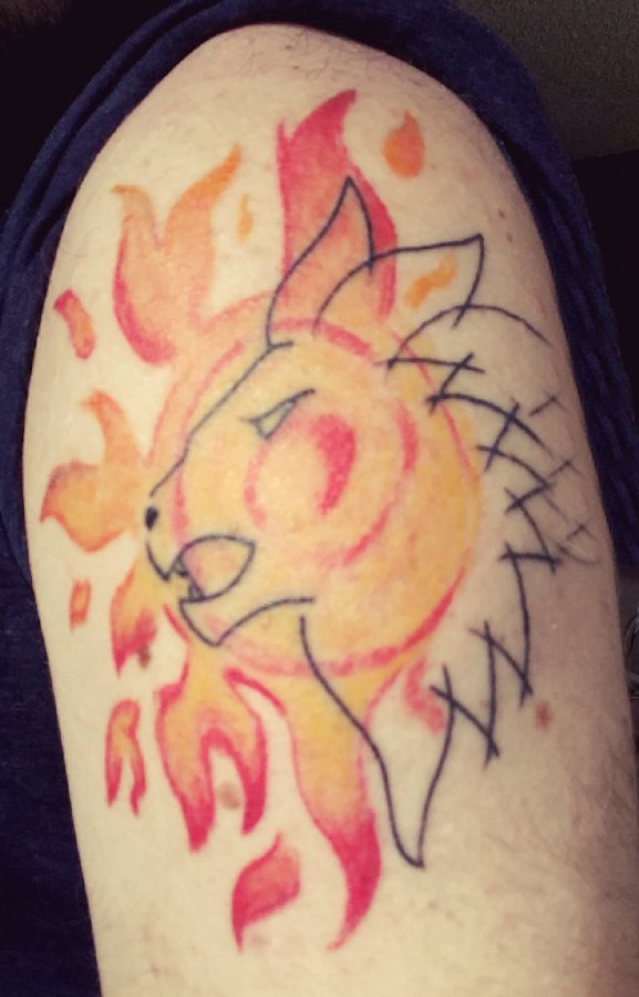 太阳和狮子纹身图案  男生大臂上太阳和狮子纹身图片