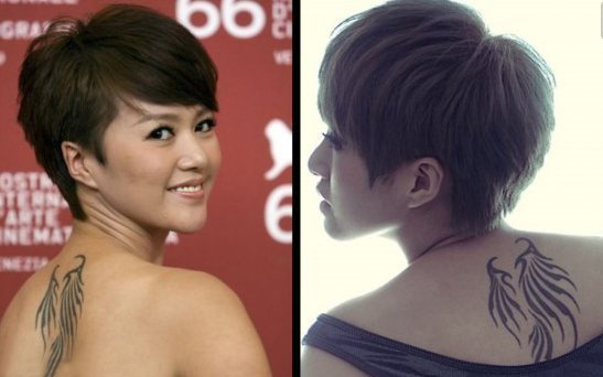 中国纹身明星 谭维维后背上黑色的翅膀纹身图片