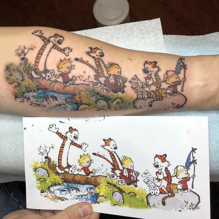卡通老虎纹身图案  男生手臂上彩绘的卡通老虎纹身图片