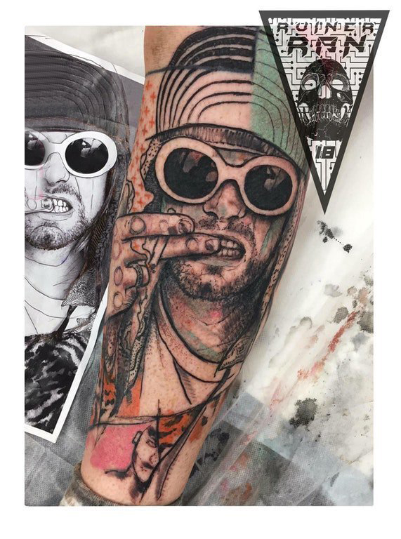 人物肖像纹身  男生手臂上彩绘的人物肖像纹身图片