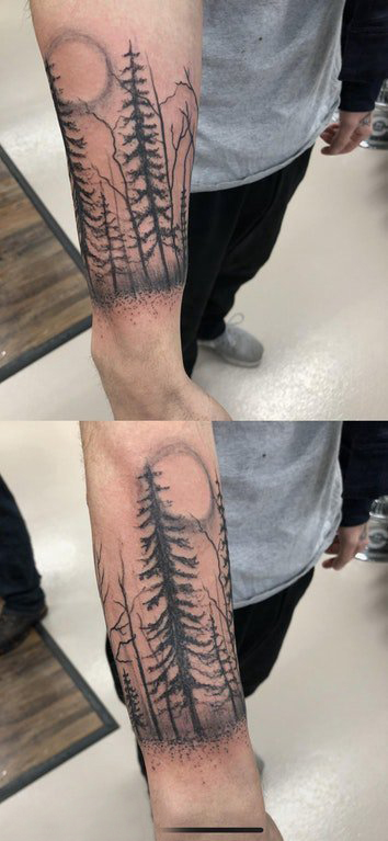 纹身树枝 男生手臂上黑灰色的树纹身图片