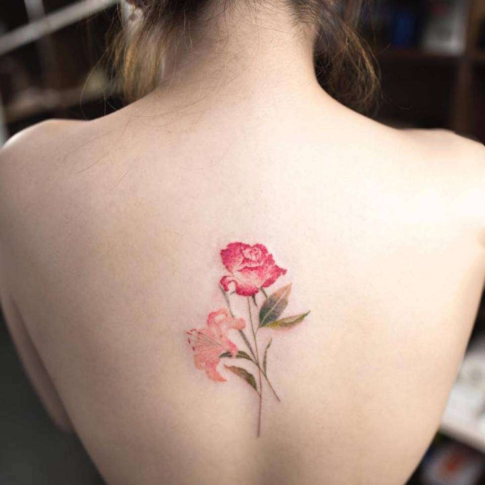 纹身图案花朵   清新却靓丽多彩的花朵纹身图案