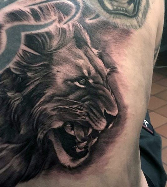 狮子头纹身图片   威猛慑人的狮子纹身图案