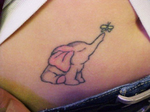 小动物纹身 彩色的女性腹部精致的小动物纹身图案