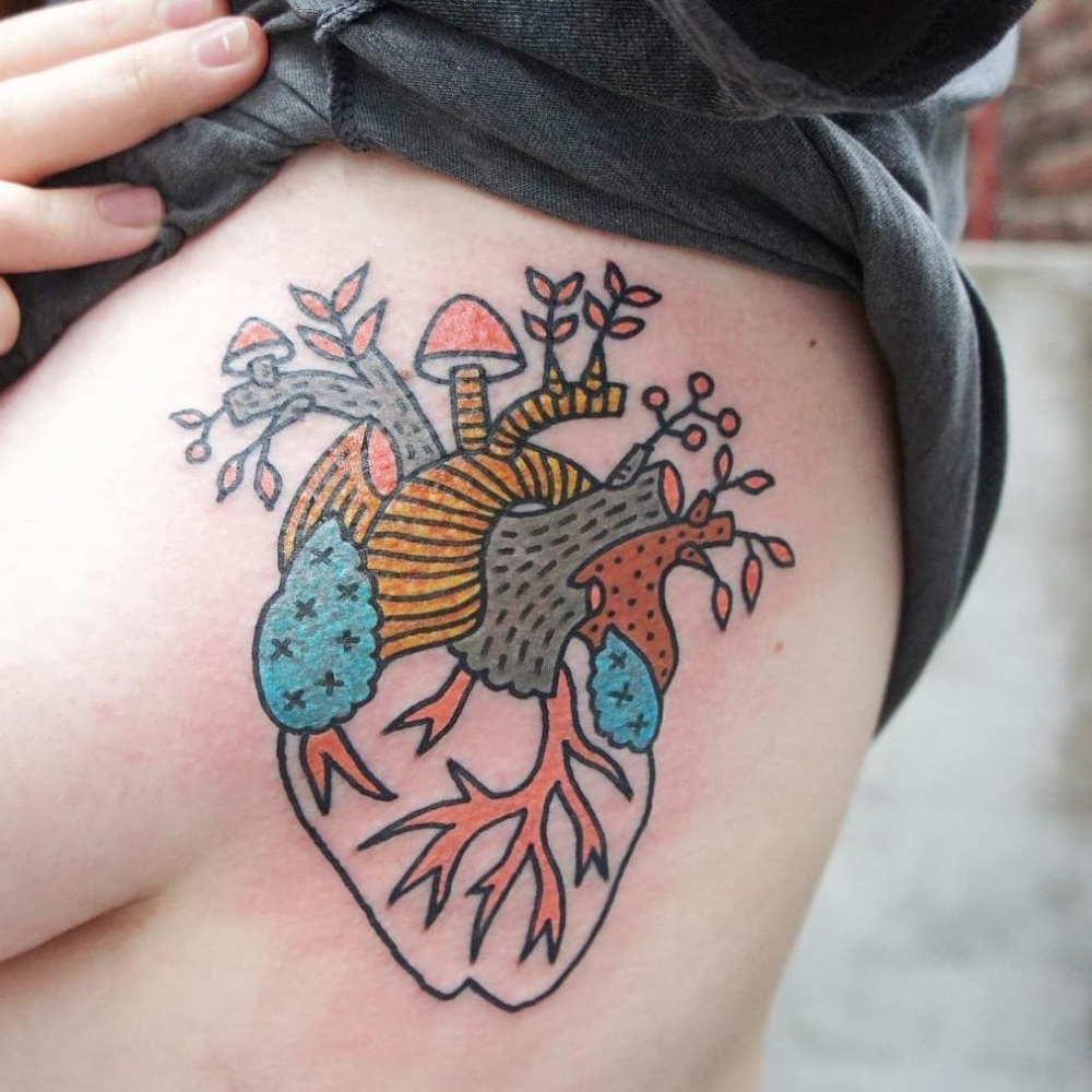 心脏纹身图案    身体各个部位彩绘纹身和写实纹身的心脏纹身图案
