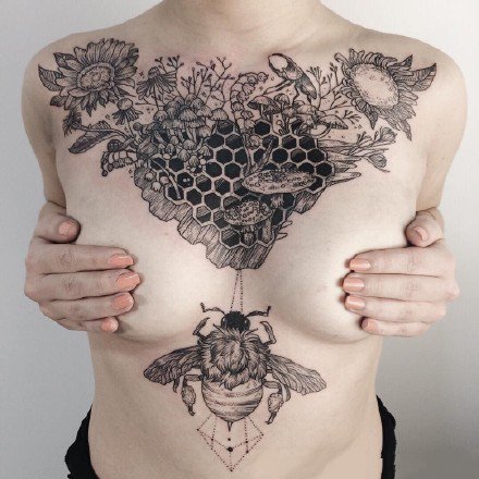 花胸纹身图案-9张好看的花胸纹身图片