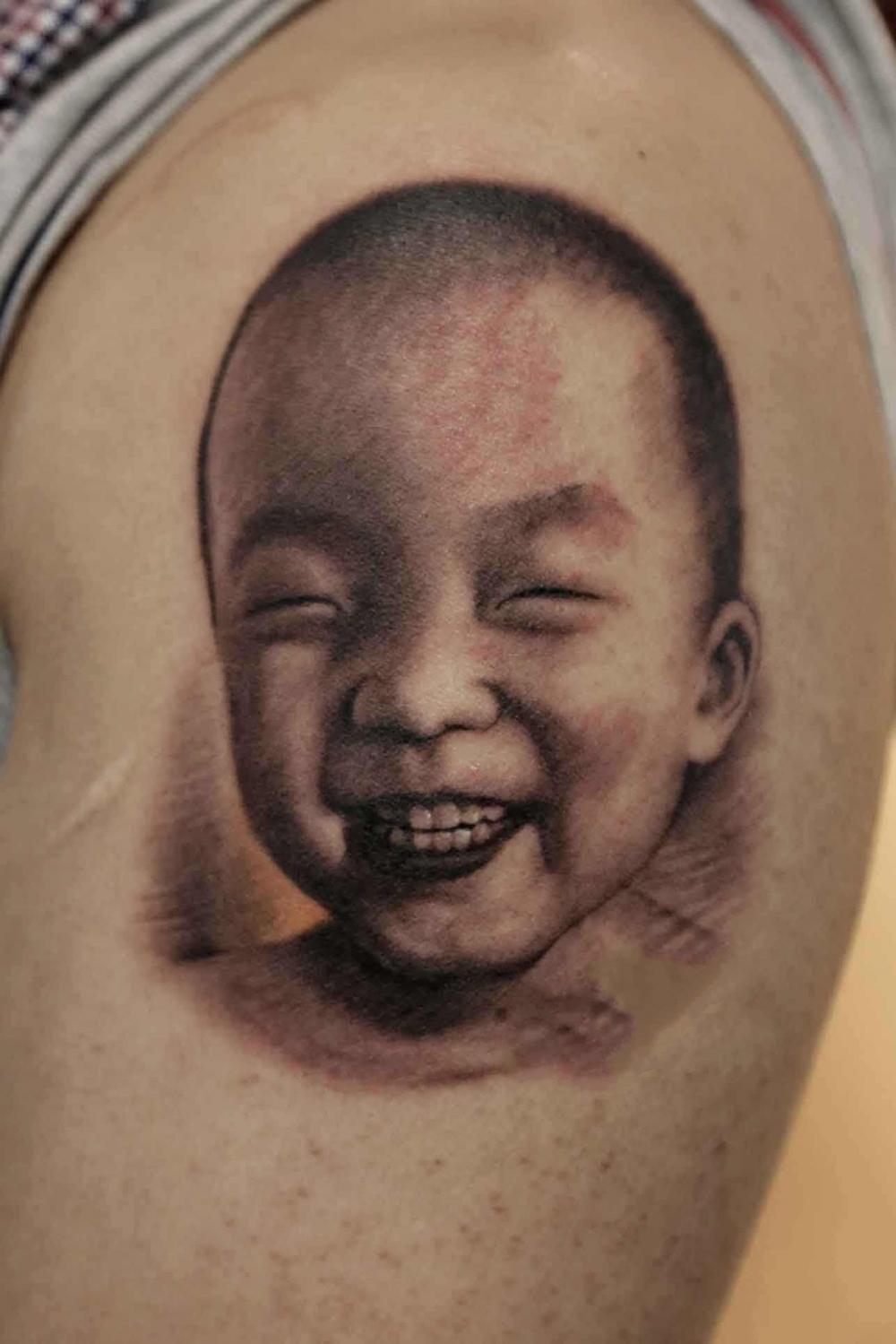 一组写实的小孩子宝宝肖像纹身图案