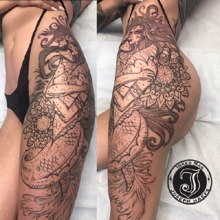 女性大腿侧到臀部的性感纹身图片