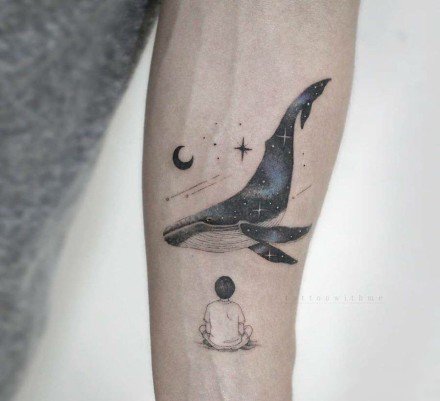 黑色的一组美丽小鲸鱼纹身图案