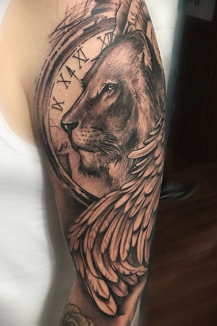 狮子 纹身图案  9张霸气而又威猛的狮子纹身图案