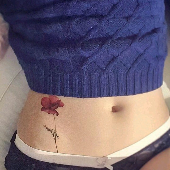 纹身清新小图片   清新而又靓丽色调的花朵纹身图案