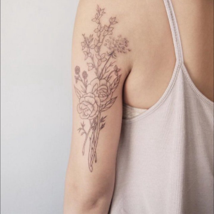纹身清新小图片   清新而又靓丽色调的花朵纹身图案