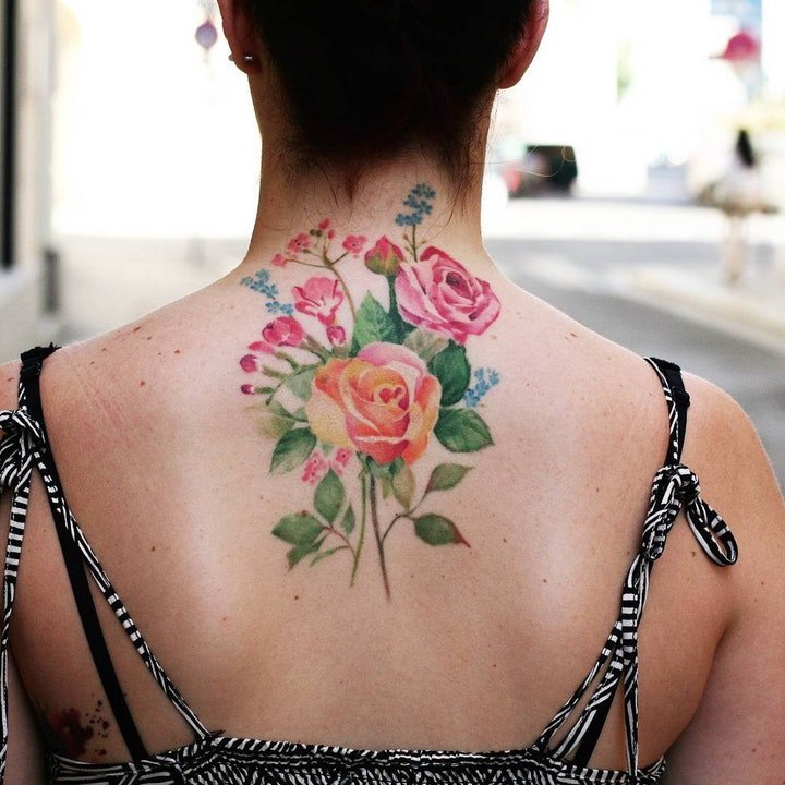 纹身清新小图片   清新而又靓丽色调的花朵纹身图案