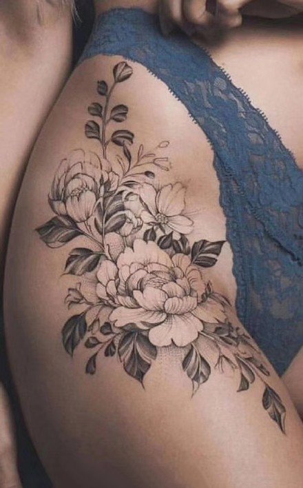 一组性感的女生大腿花朵纹身图案
