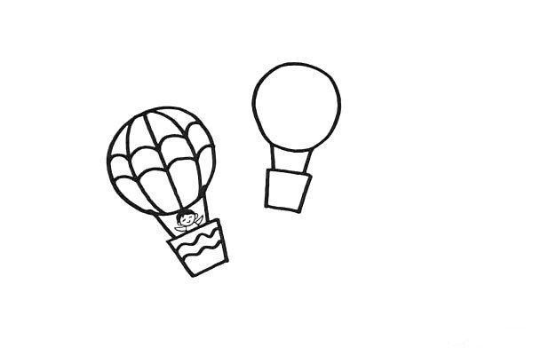 8.同样的画法.再画上另一个热气球。