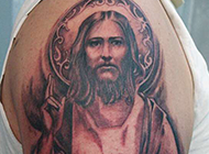 耶稣头像男手臂纹身图案