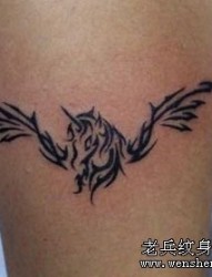 独角兽纹身图片：一张手臂图腾独角兽翅膀纹身图案