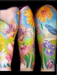 花卉纹身图片：手臂彩色向日葵花卉七星瓢虫蝴蝶纹身图案