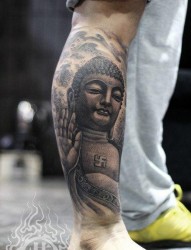腿部经典帅气的一张如来佛祖纹身图片