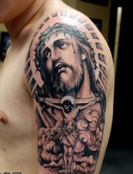 大臂耶稣头像纹身图片