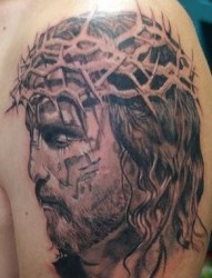 一张大臂耶稣肖像头像纹身图片