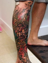 腿部超帅的一张护法神纹身图片