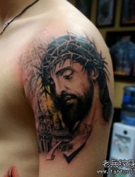 手臂一张经典的耶稣肖像纹身图片