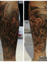 腿部一张韦驮菩萨与昙花纹身图片