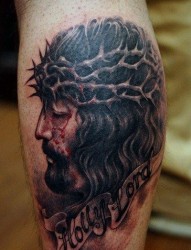 腿部经典超酷的耶稣头像纹身图片