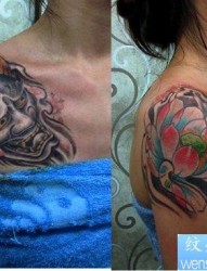 南京纹身图片展示：一幅美女的半甲般若与莲花纹身图片