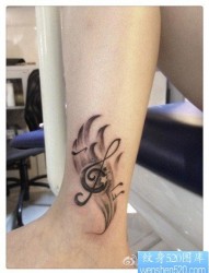 女人腿部时尚唯美的音符纹身图片