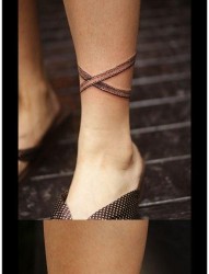 女人腿部漂亮潮流的蕾丝蝴蝶结纹身图片