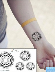纹身520图库分享一幅图腾太阳纹身图片